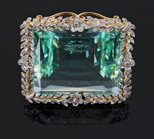 Appraisal: An Edwardian aquamarine and diamond brooch the large central stone