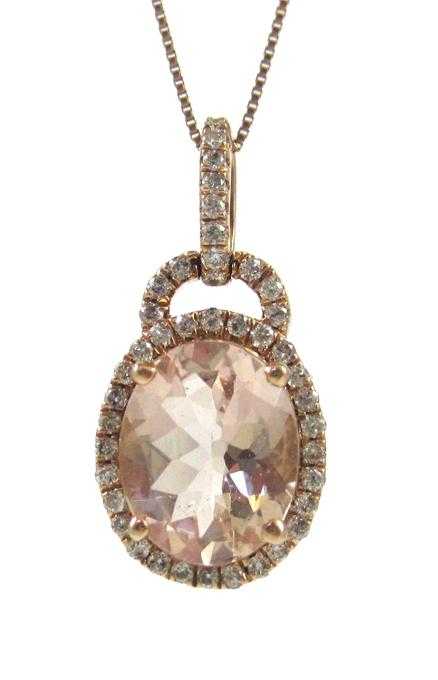 Appraisal: KUNZITE AND DIAMOND PENDANT NECKLACE suspended on a - inch