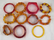 Appraisal: A mixed lot of Bakelite or similar imitation amber bracelets