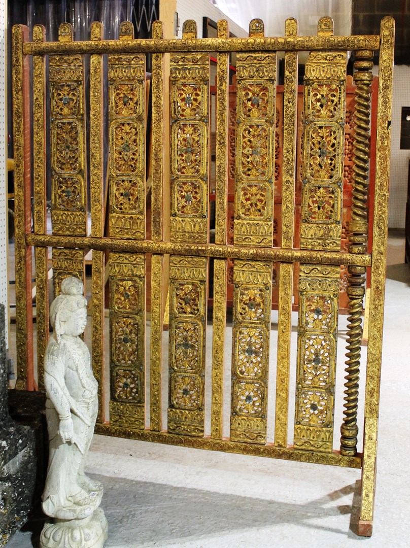 Appraisal: A pair of Eastern red lacquered parcel gilt coloured glass