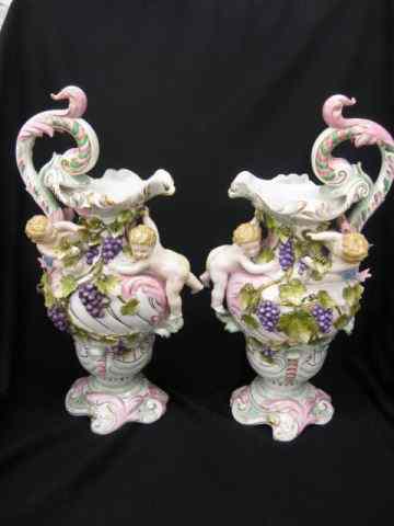 Appraisal: Pair of Fine Porcelain Ewers putti with grape vine decor