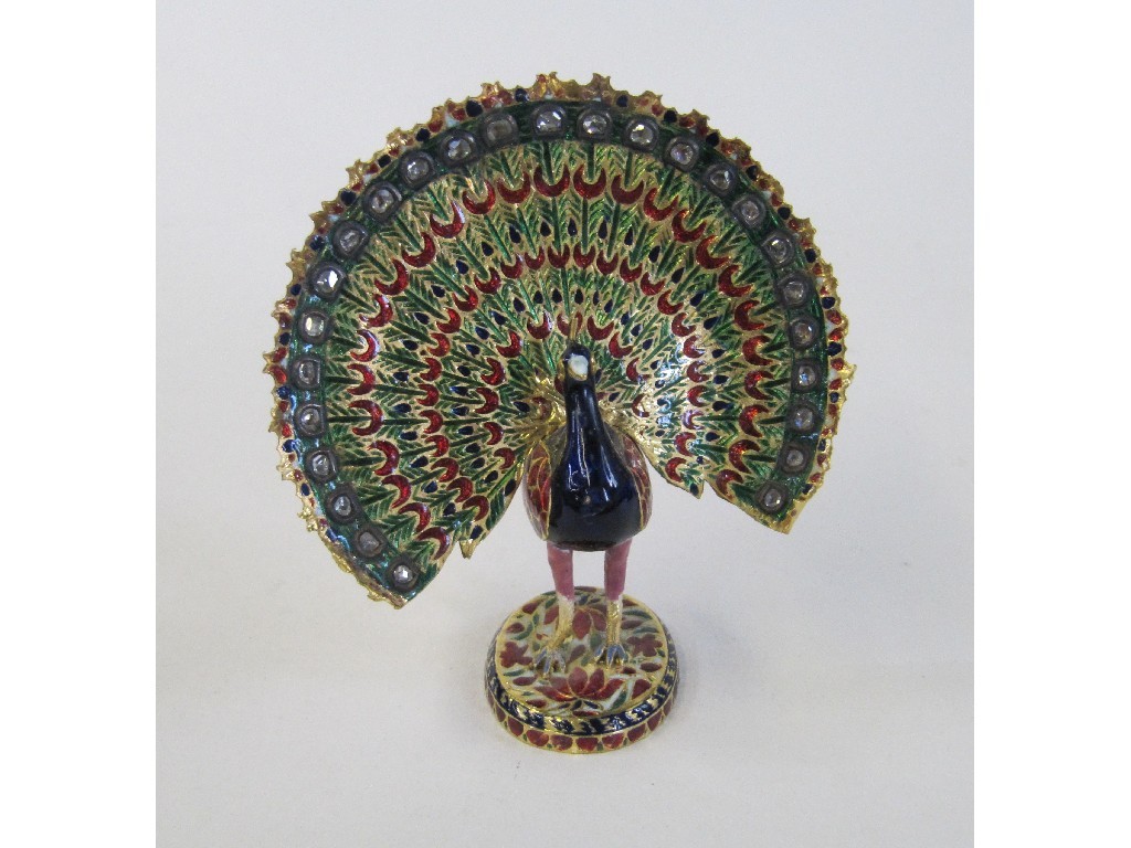 Appraisal: Gilt metal enamel and gem set table ornament modelled as