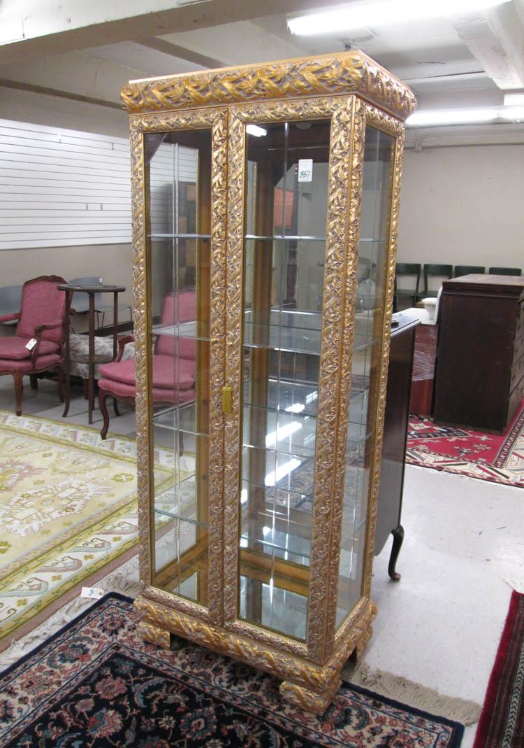 Appraisal: ITALIAN CONTEMPORARY GILTWOOD ILLUMINATED CURIO CABINET Mongelli S R L