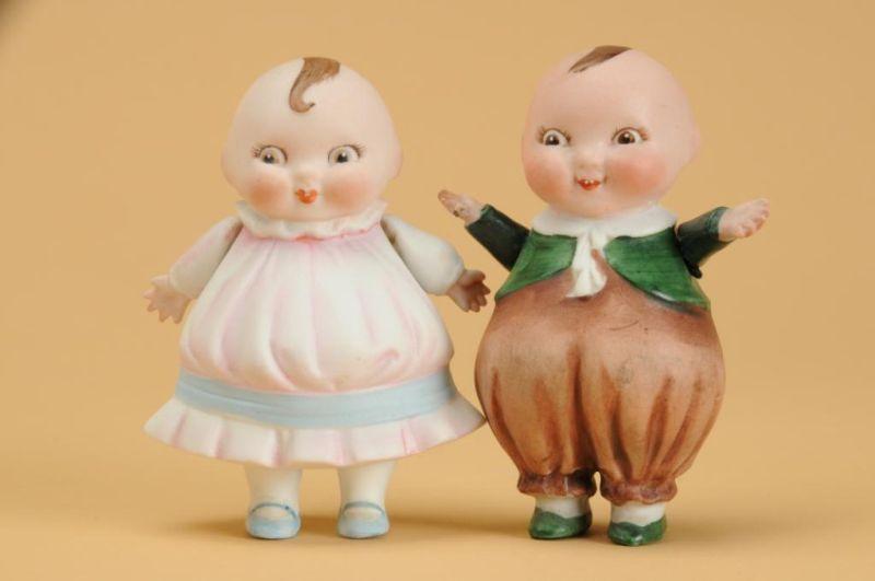 Appraisal: Pair of Happy Fat Dolls Germany all bisque boy and