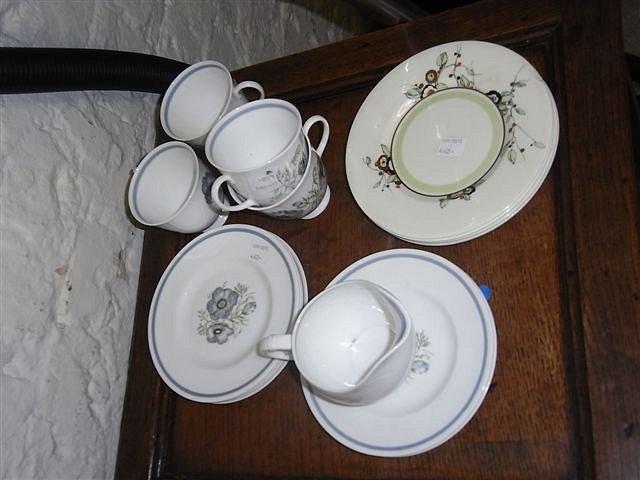 Appraisal: A SET OF FOUR ROYAL DOULTON RIGI PATTERN TEA PLATES