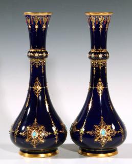 Appraisal: A PAIR OF SEVRES TYPE 'JEWELED' PORCELAIN VASES An early