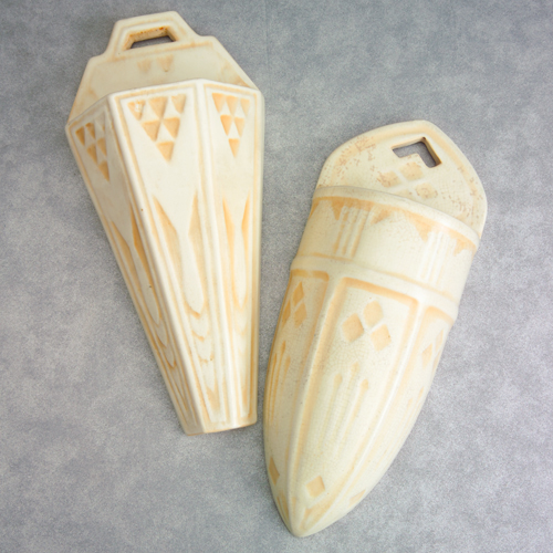 Appraisal: Two ROSEVILLE Ivory Tint wall pockets both with geometric designs