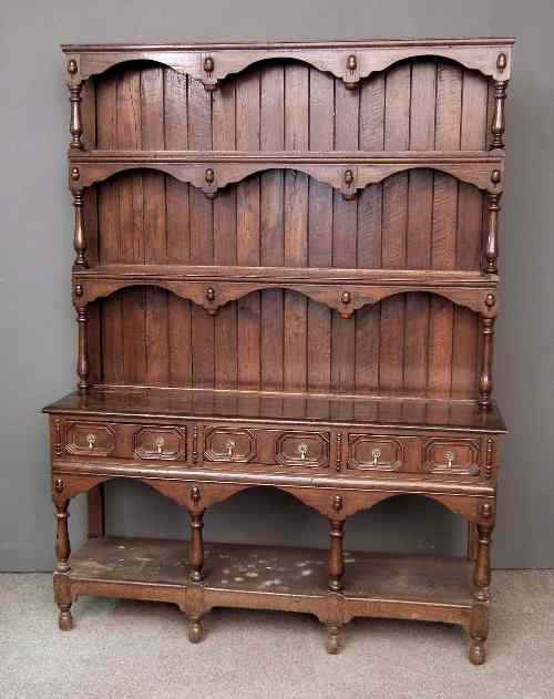 Appraisal: An th Century oak dresser with acorn moulding throughout and