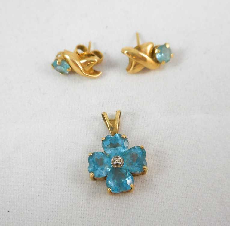 Appraisal: BLUE TOPAZ PENDANT AND EARRINGS including a k yellow gold