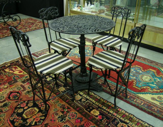 Appraisal: French Cast Iron Parlor Table and Folding Chairs Pedestal Base