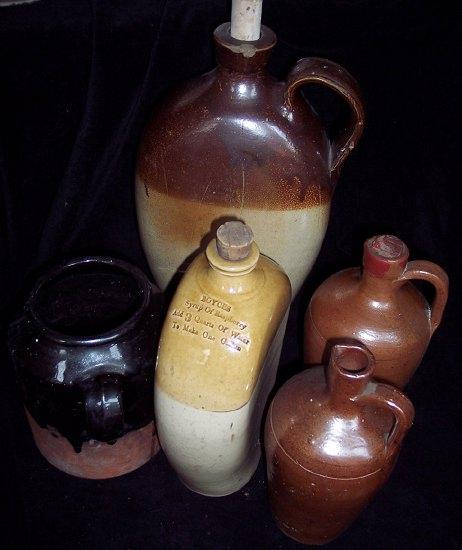 Appraisal: A stoneware bottle of oval shape stamped 'Boyces Syrup of