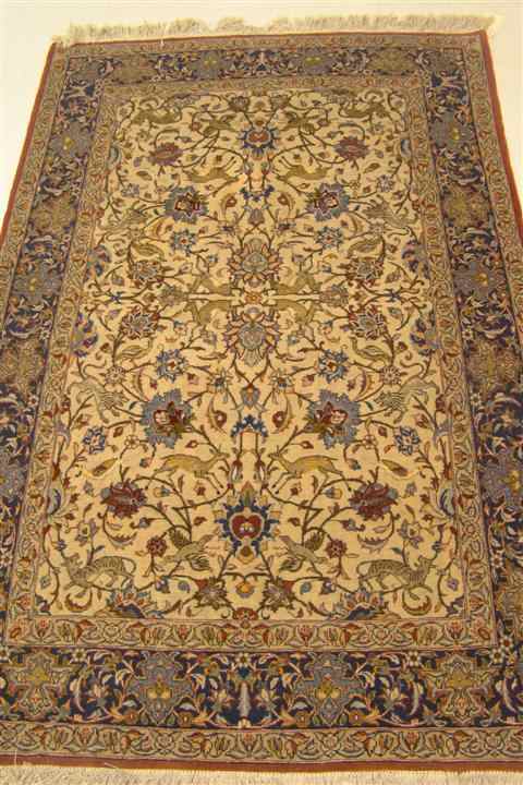 Appraisal: PERSIAN KASHAN HUNTING SCENE RUG cream red blue navy black