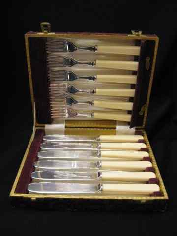 Appraisal: Sheffield Silverplate Fish Set knives forks in original box celluliod