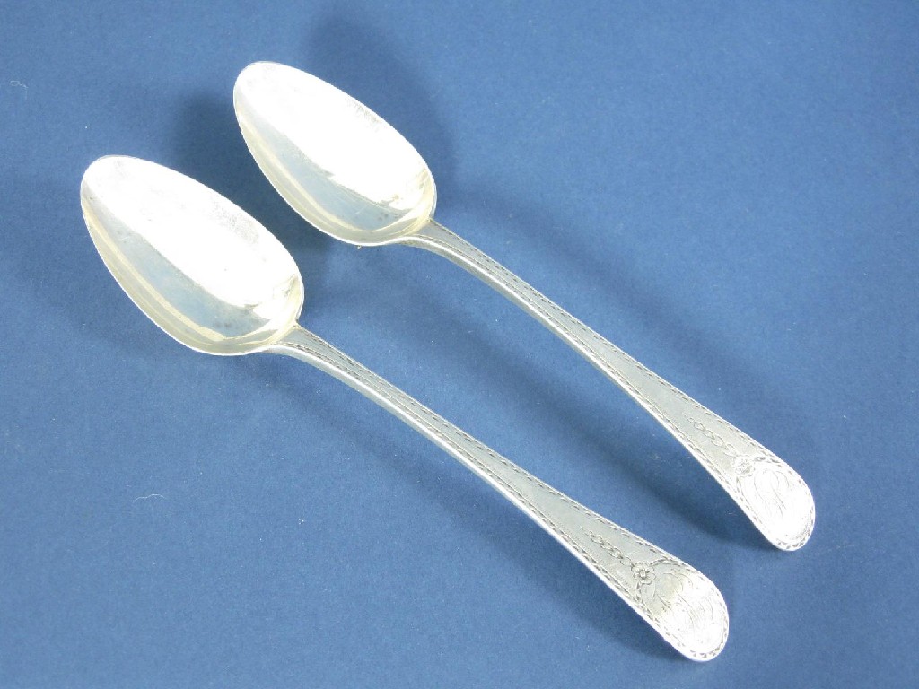 Appraisal: Pair of George III Table Spoons old English pattern with