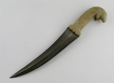 Appraisal: A Mughal style dagger the soapstone hilt carved as an