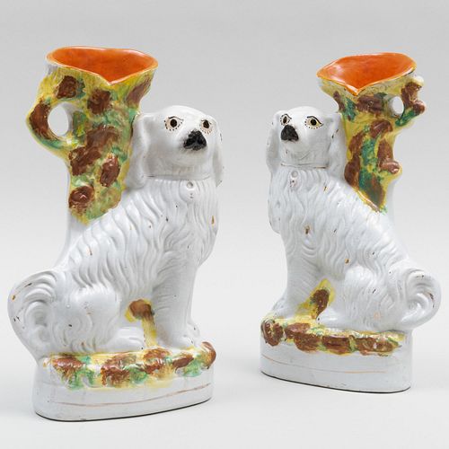 Appraisal: PAIR OF STAFFORDSHIRE SPANIEL SPILL VASESUnmarked x x in The