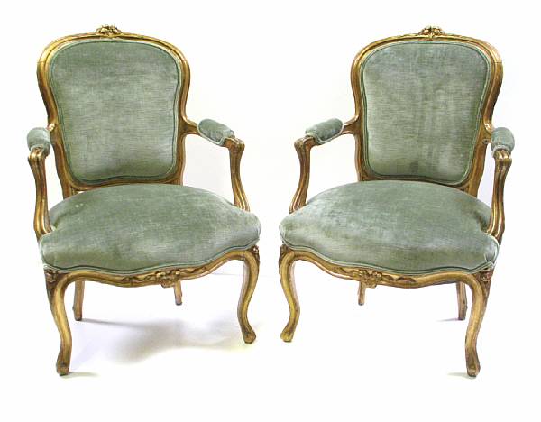 Appraisal: A pair of Louis XV style giltwood fauteuils second half