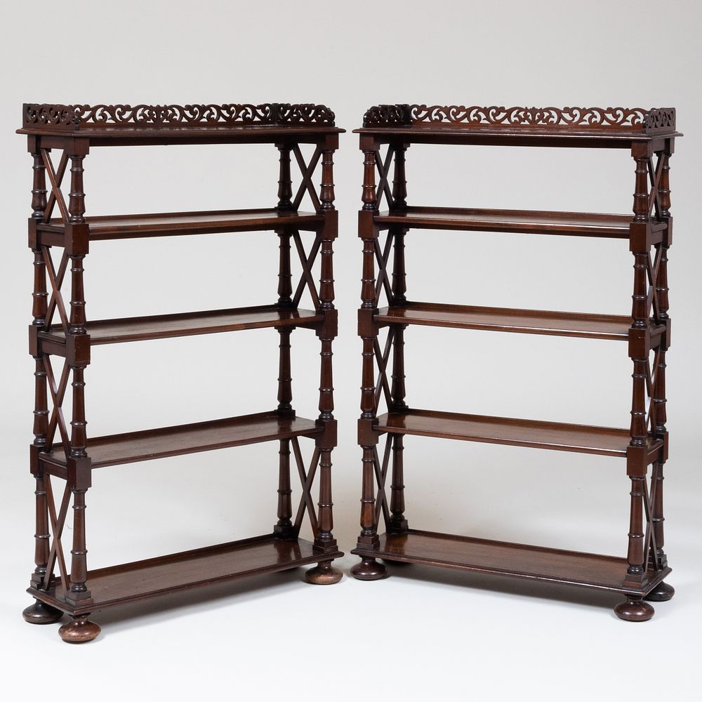 Appraisal: Pair of Victorian Carved Mahogany Five-Tier tag res Both with