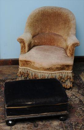 Appraisal: LATE VICTORIAN TURKISH-STYLE VELVET-UPHOLSTERED ARMCHAIR The arched concave back above