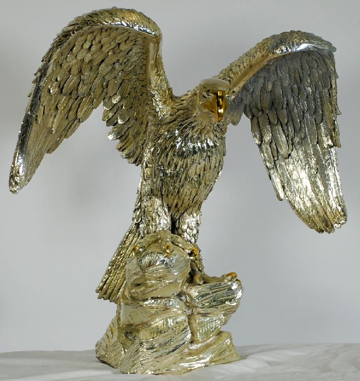 Appraisal: MODERN CONTINENTAL ELECTROPLATED METAL MODEL OF AN EAGLE modelled resting