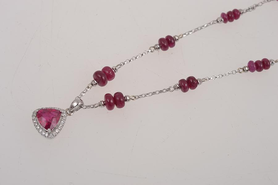 Appraisal: A RUBY AND DIAMOND PENDANT IN CT WHITE GOLD A