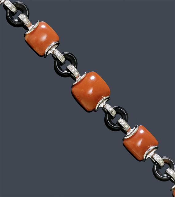 Appraisal: A CORAL ONYX AND DIAMOND BRACELET White gold Art Deco