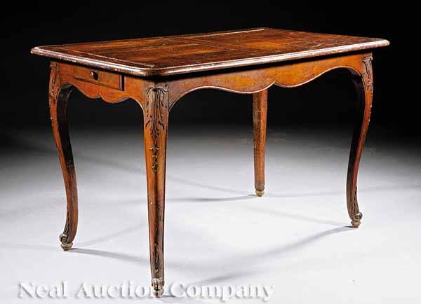 Appraisal: A Provincial Carved Fruitwood Table in the Louis XV Style