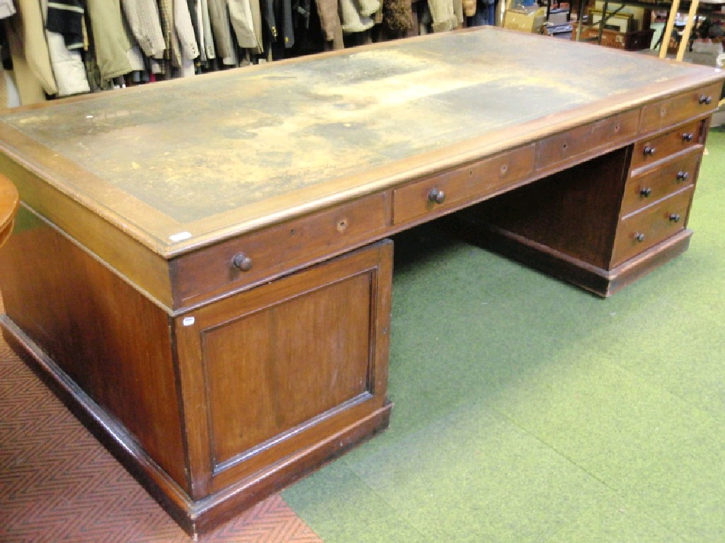 Appraisal: A large Victorian mahogany partners desk with inset leather top