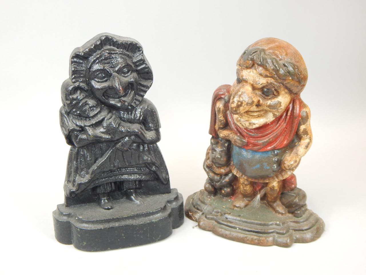 Appraisal: Two cast iron door stops Mr Mrs Punch