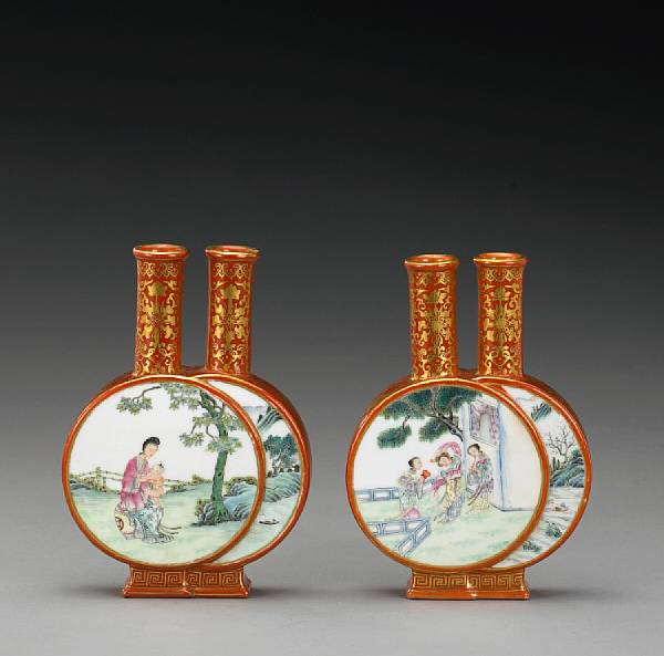 Appraisal: A pair of coral ground porcelain double-moon flasks Qianlong Marks