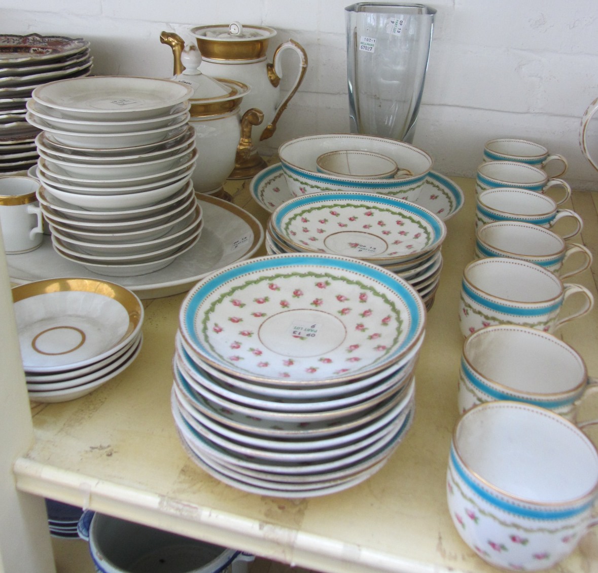 Appraisal: An Empire style parcel gilt porcelain coffee service comprising coffee