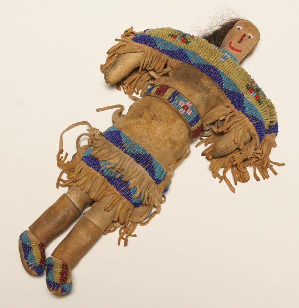 Appraisal: Native American toy vintage buckskin doll with beaded dress and