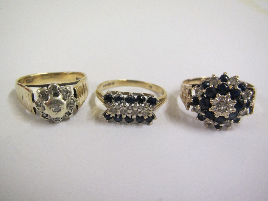 Appraisal: Lot comprising two ct gold sapphire and diamond cluster rings