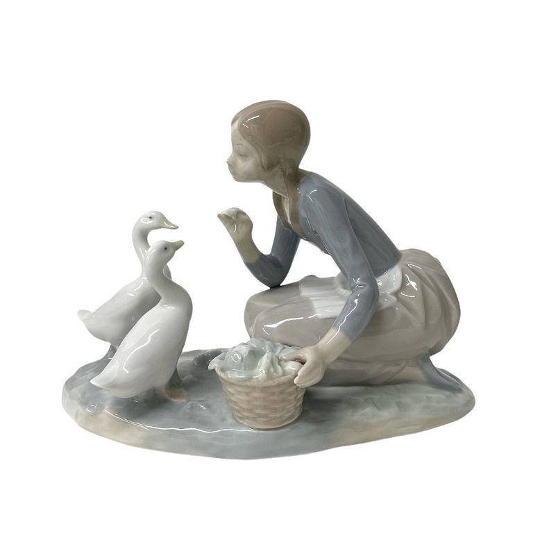 Appraisal: Lladro Girl With Duck Group Porcelain Figure Lladro Girl With