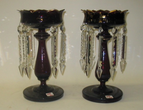 Appraisal: PAIR BURGUNDY-RED ART GLASS LUSTRES each having hanging faceted crystal