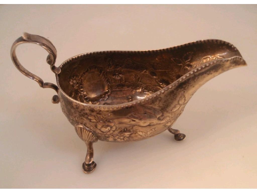 Appraisal: An thC Irish silver sauce boat hallmark rubbed with later