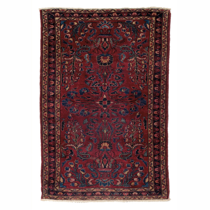 Appraisal: Persian Lilihan rug c stylized floral design on a red