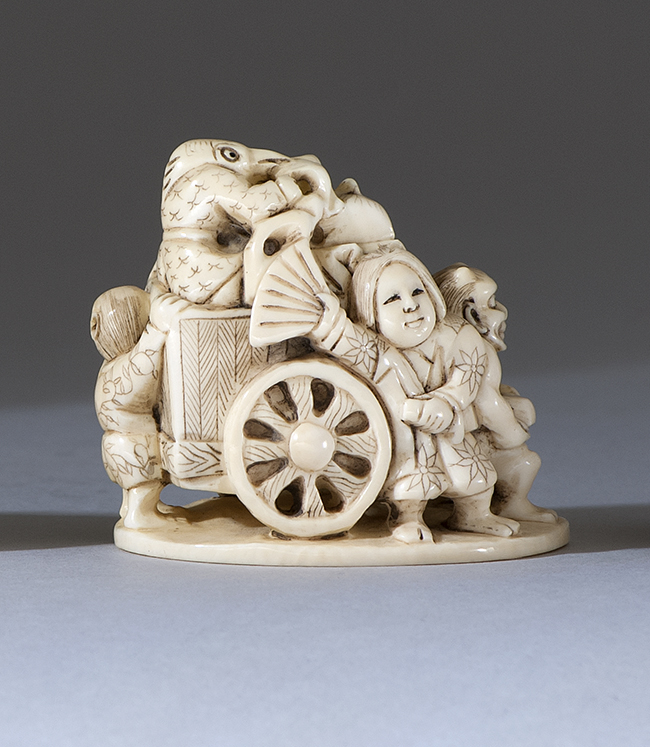 Appraisal: IVORY NETSUKE Early th CenturyDepicting an oni dog sparrow and