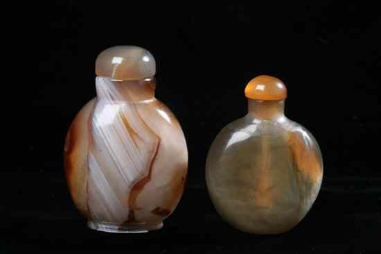 Appraisal: TWO CHINESE AGATE SNUFF BOTTLES Flattened ovoid-form very well hollowed