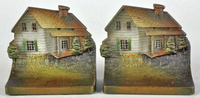 Appraisal: Pair of Cast Iron Edgar Allen Poe Cabin Bookends Description