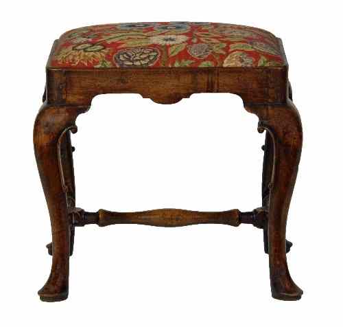 Appraisal: A Queen Anne walnut stool circa on cabriole legs joined