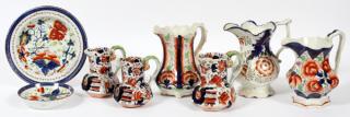 Appraisal: GAUDY DUTCH PORCELAIN PITCHERS CREAMERS AND PLATES GAUDY DUTCH PORCELAIN