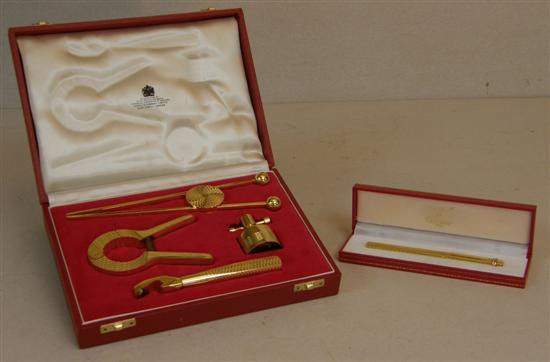 Appraisal: Asprey gilt metal wine and cocktail set comprising ice tongs