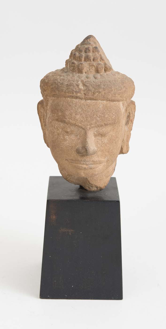 Appraisal: KHMER SANDSTONE HEAD OF BUDDHA CAMBODIA Raised on a stand