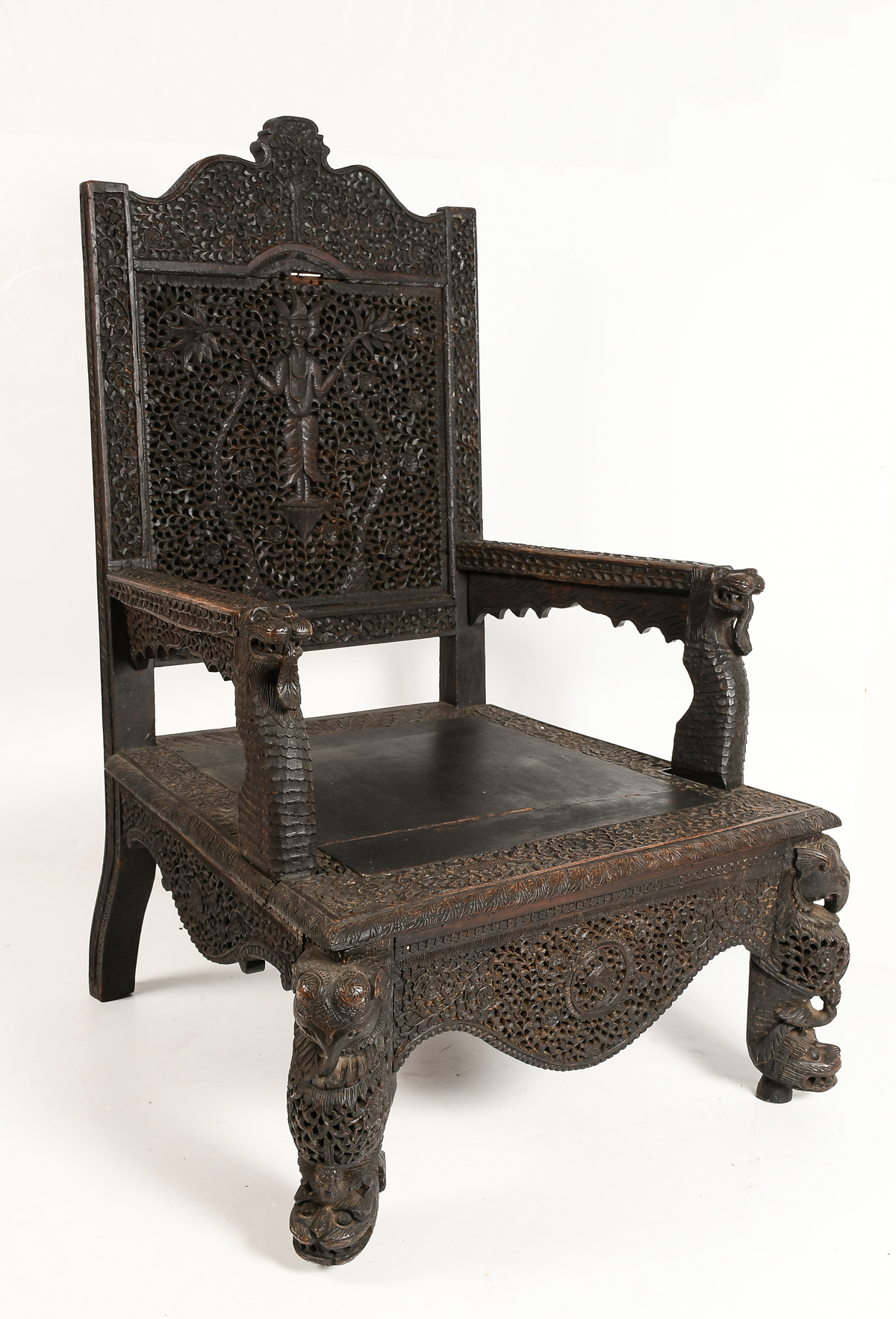 Appraisal: CARVED ROSEWOOD MOORISH FIGURAL ARMCHAIR Having a pierced foliate floral