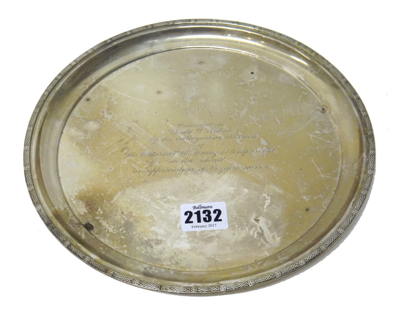 Appraisal: A silver circular salver having a decorated border presentation inscribed