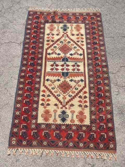 Appraisal: Oriental wool pile geometric design rug Measures ' '' x