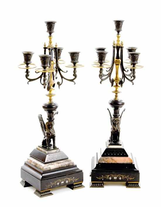 Appraisal: Pair Egyptian Revival five-light candelabra circa brass and metal figural