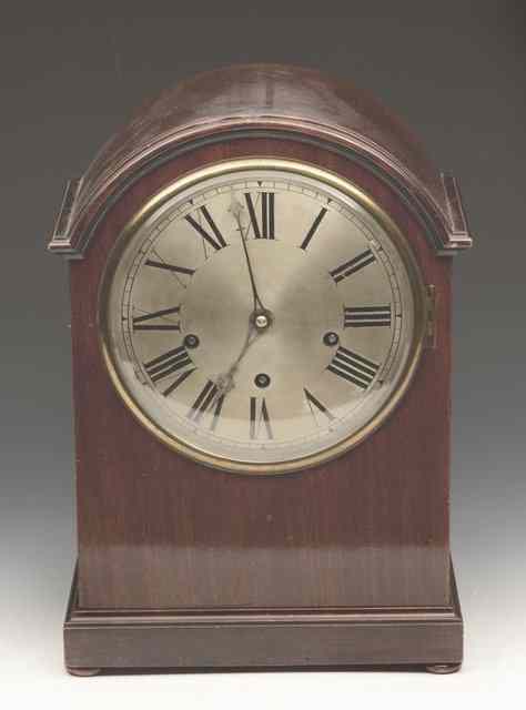 Appraisal: A TH CENTURY MAHOGANY BRACKET CLOCK of dome top form