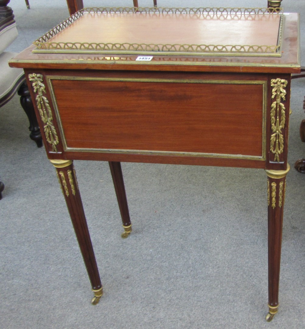 Appraisal: A Louis XVI style gilt metal mounted rectangular mahogany jardiniere